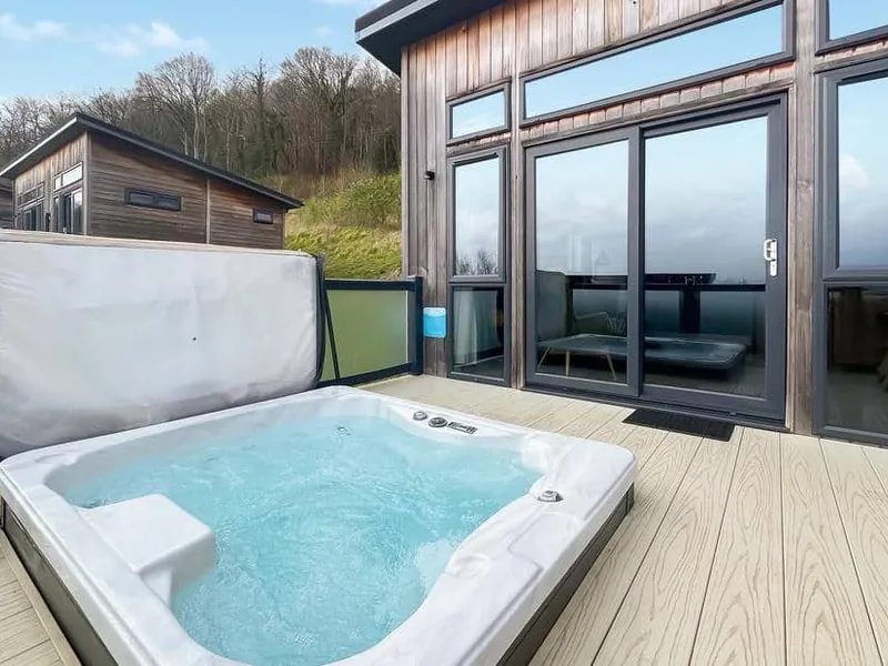 Burrington Premier lodge with private outdoor hot tub on decking