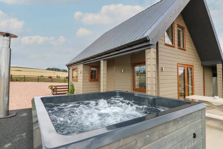 Garden Studio with a private hot tub outside and countryside views