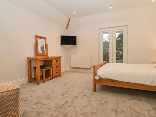 Bedroom featuring wooden furniture