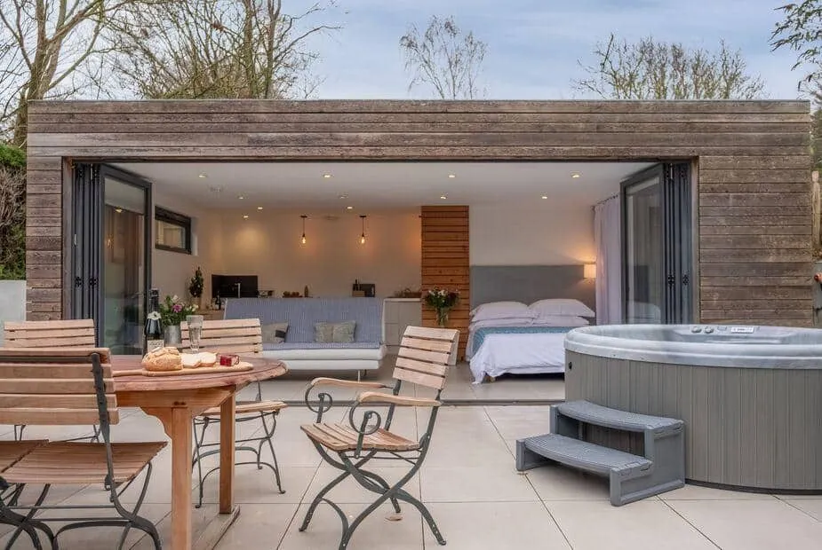 The Garden Room with open-plan interior and patio hot tub